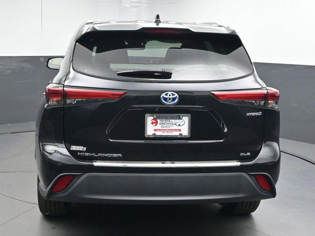 used 2023 Toyota Highlander Hybrid car, priced at $28,694