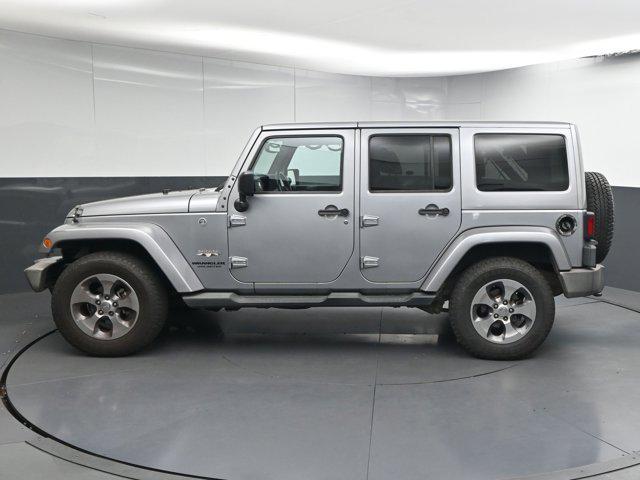 used 2016 Jeep Wrangler Unlimited car, priced at $16,392