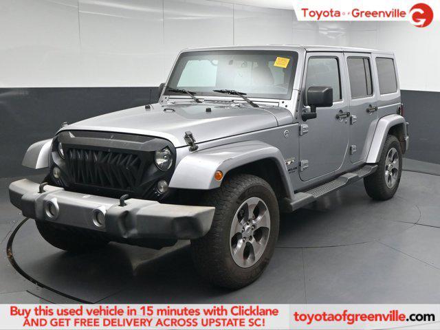 used 2016 Jeep Wrangler Unlimited car, priced at $16,392