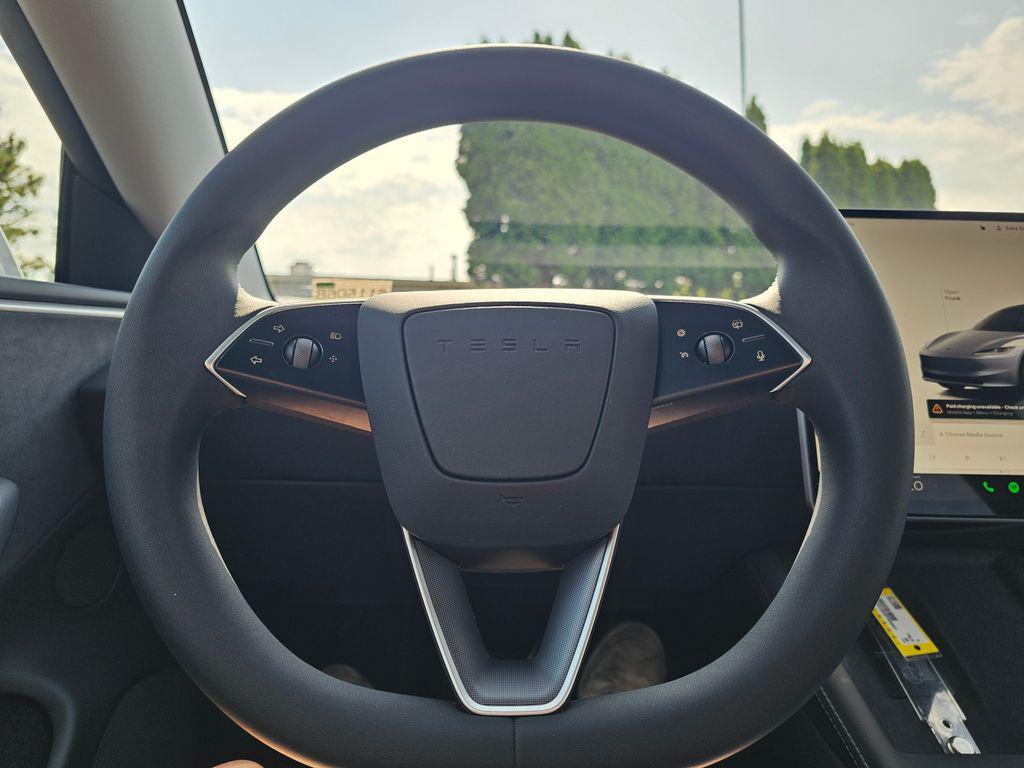 used 2025 Tesla Model 3 car, priced at $37,998