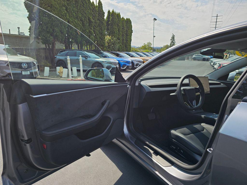used 2025 Tesla Model 3 car, priced at $37,998