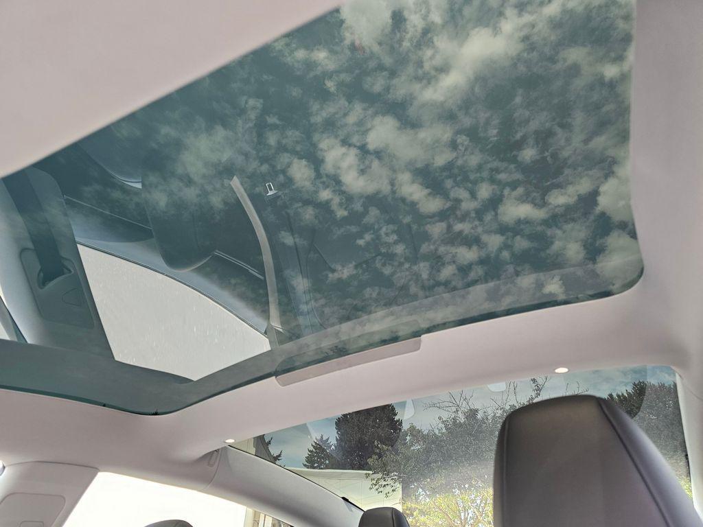 used 2025 Tesla Model 3 car, priced at $37,998