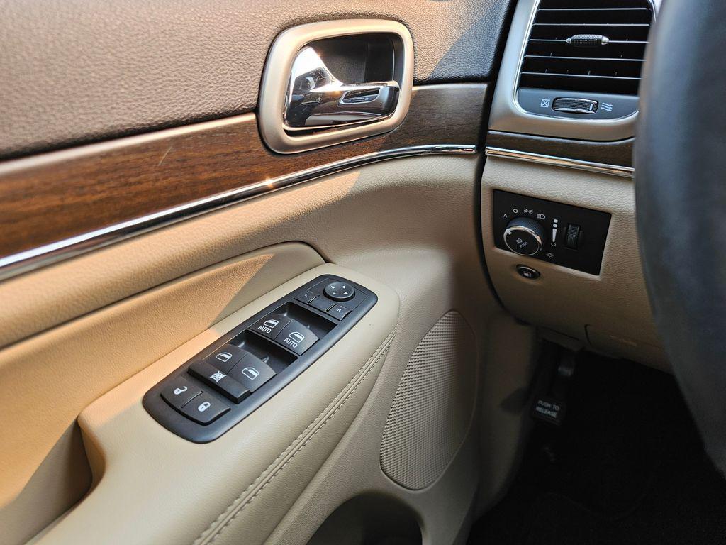 used 2016 Jeep Grand Cherokee car, priced at $13,990