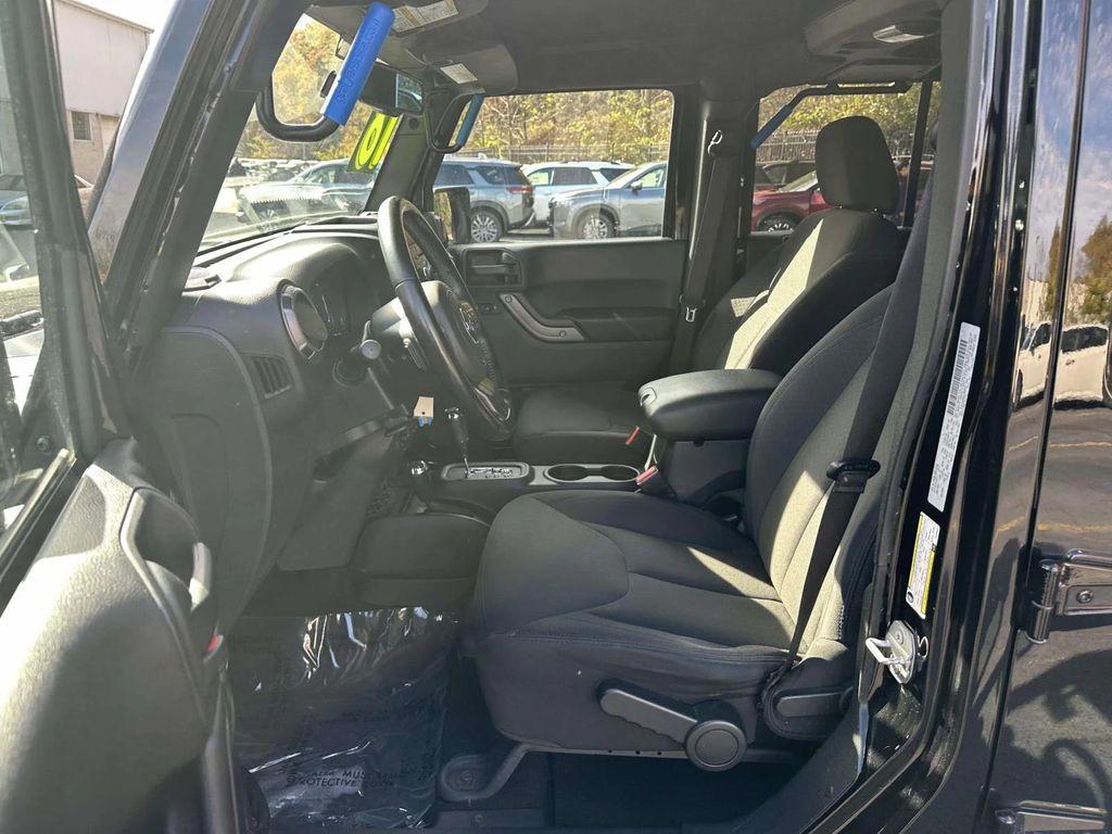 used 2018 Jeep Wrangler JK Unlimited car, priced at $19,797