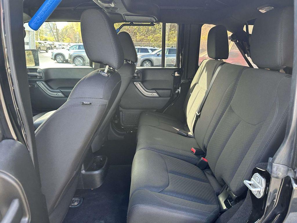 used 2018 Jeep Wrangler JK Unlimited car, priced at $19,797