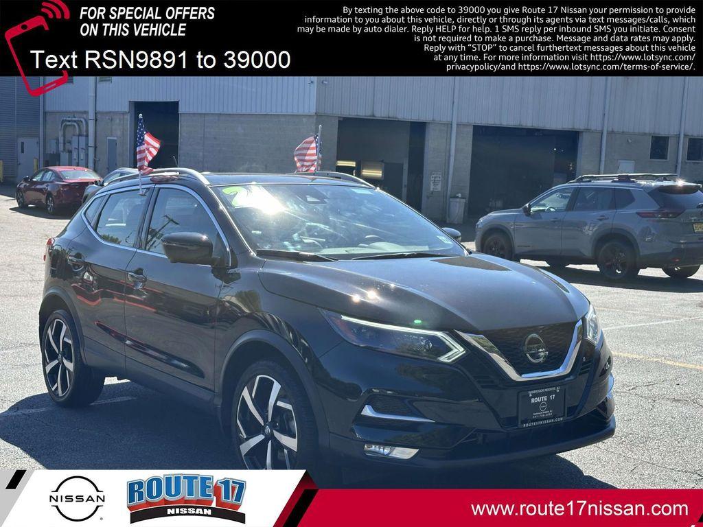 used 2021 Nissan Rogue Sport car, priced at $19,697