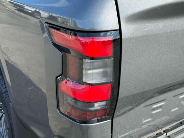 used 2025 Nissan Frontier car, priced at $29,990
