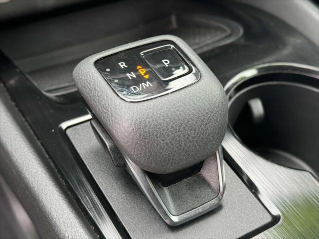 used 2023 Nissan Rogue car, priced at $17,990