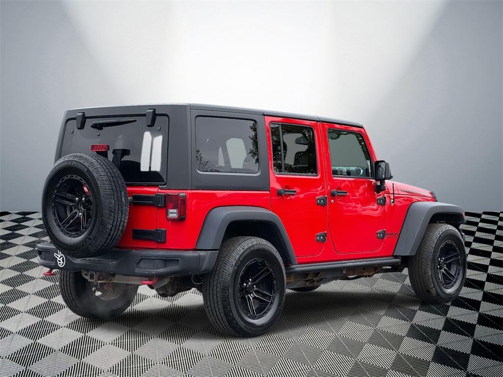 used 2015 Jeep Wrangler Unlimited car, priced at $15,500
