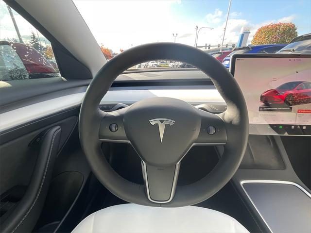 used 2023 Tesla Model 3 car, priced at $27,355