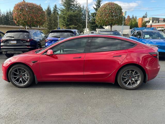 used 2023 Tesla Model 3 car, priced at $27,355