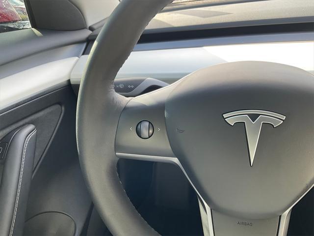 used 2023 Tesla Model 3 car, priced at $27,355