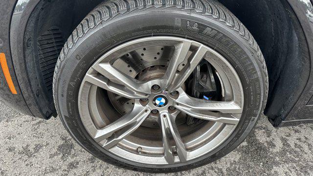 used 2024 BMW X4 M car, priced at $73,849
