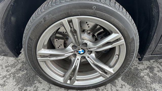 used 2024 BMW X4 M car, priced at $73,849