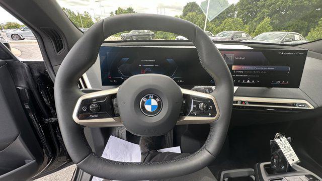 new 2026 BMW iX car, priced at $80,575