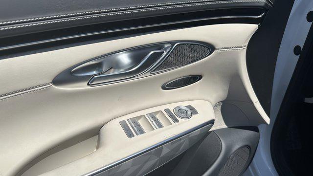 used 2025 Genesis GV70 car, priced at $61,596