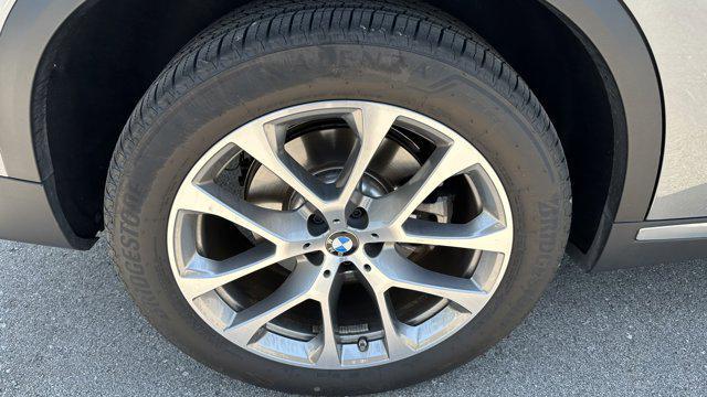 used 2025 BMW X5 car, priced at $72,907