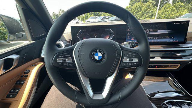 used 2025 BMW X5 car, priced at $72,907