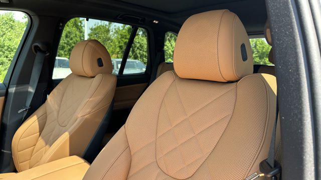 used 2025 BMW X5 car, priced at $72,907