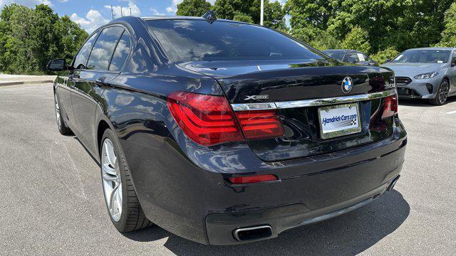 used 2013 BMW 750 car, priced at $13,995