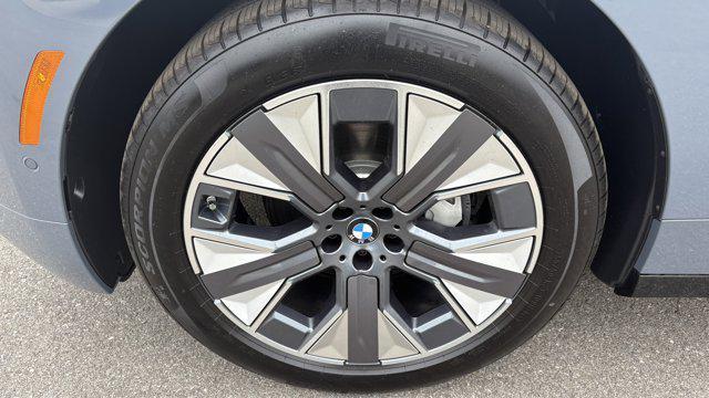 new 2026 BMW iX car, priced at $82,525