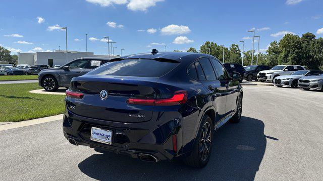 used 2023 BMW X4 car, priced at $45,453