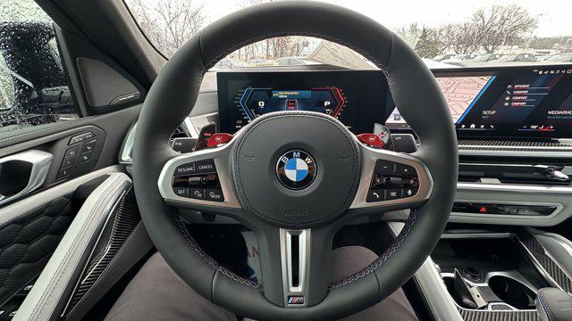 new 2025 BMW X6 M car, priced at $140,550
