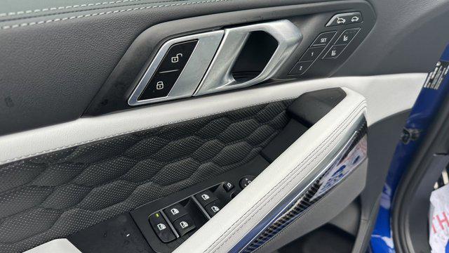 new 2025 BMW X6 M car, priced at $140,550