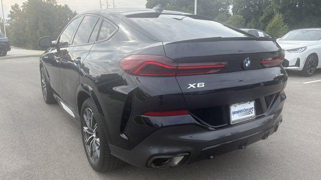used 2023 BMW X6 car, priced at $53,879