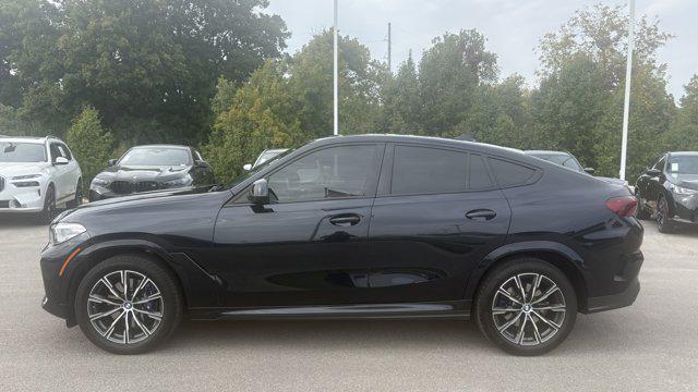 used 2023 BMW X6 car, priced at $53,879