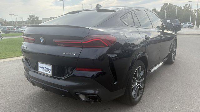 used 2023 BMW X6 car, priced at $53,879