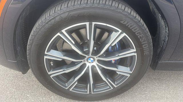 used 2023 BMW X6 car, priced at $53,879