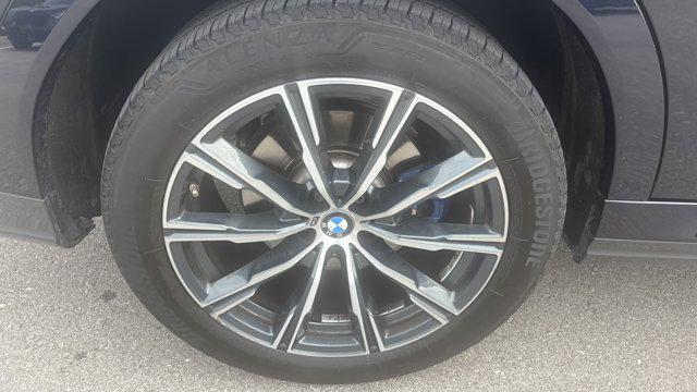 used 2023 BMW X6 car, priced at $53,879