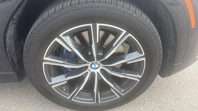 used 2023 BMW X6 car, priced at $53,879