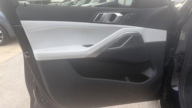 used 2023 BMW X6 car, priced at $53,879