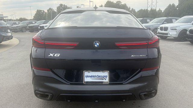 used 2023 BMW X6 car, priced at $53,879