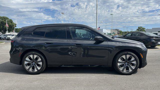 new 2026 BMW iX car, priced at $85,725