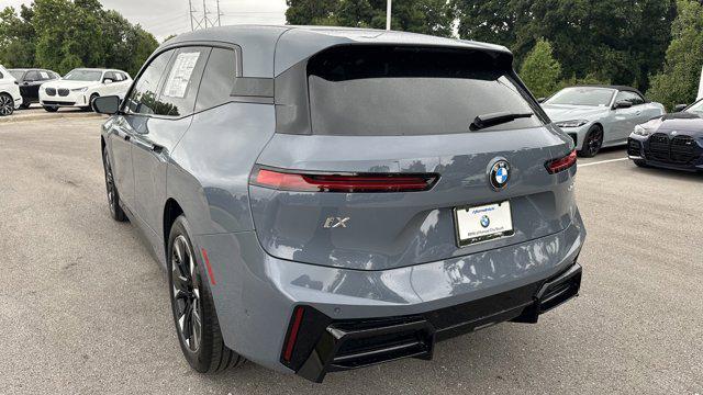 new 2026 BMW iX car, priced at $90,910
