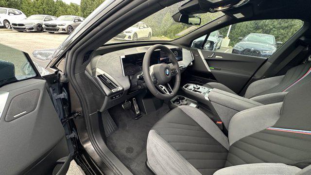 new 2026 BMW iX car, priced at $90,910