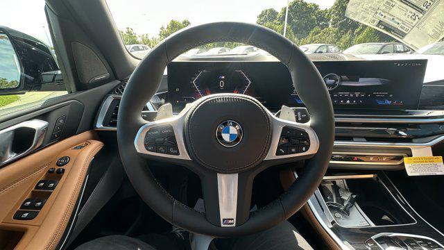 new 2026 BMW X5 car, priced at $84,075
