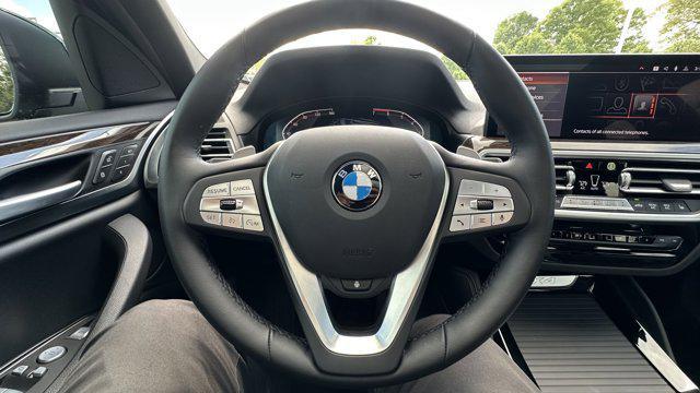 used 2023 BMW X4 car, priced at $48,549