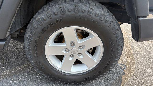 used 2016 Jeep Wrangler Unlimited car, priced at $21,834