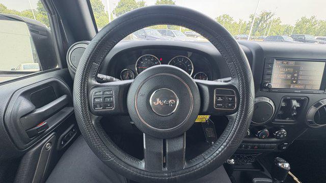 used 2016 Jeep Wrangler Unlimited car, priced at $21,834