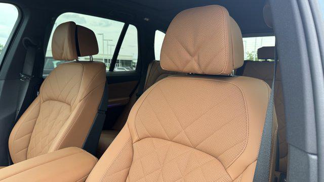 used 2025 BMW X5 car, priced at $73,948