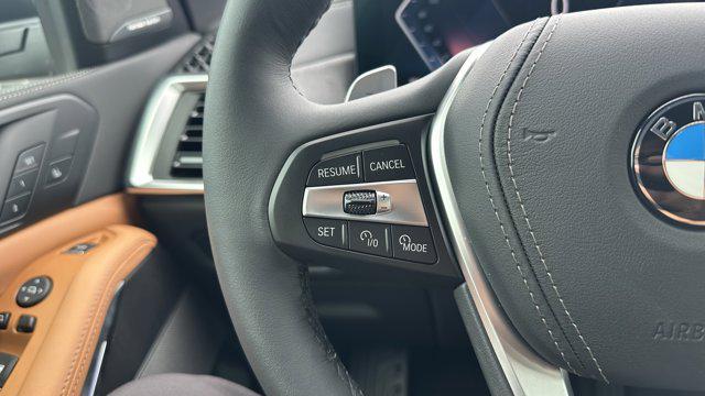 used 2025 BMW X5 car, priced at $73,948