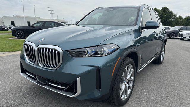 used 2025 BMW X5 car, priced at $73,948