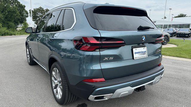 used 2025 BMW X5 car, priced at $73,948