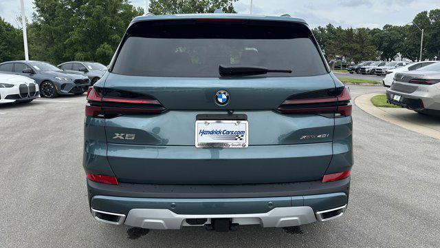 used 2025 BMW X5 car, priced at $73,948
