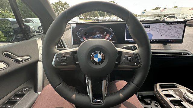 new 2026 BMW iX car, priced at $97,560