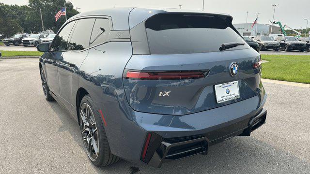new 2026 BMW iX car, priced at $97,560